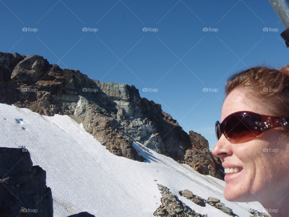 Looking at snow covered mountains 
