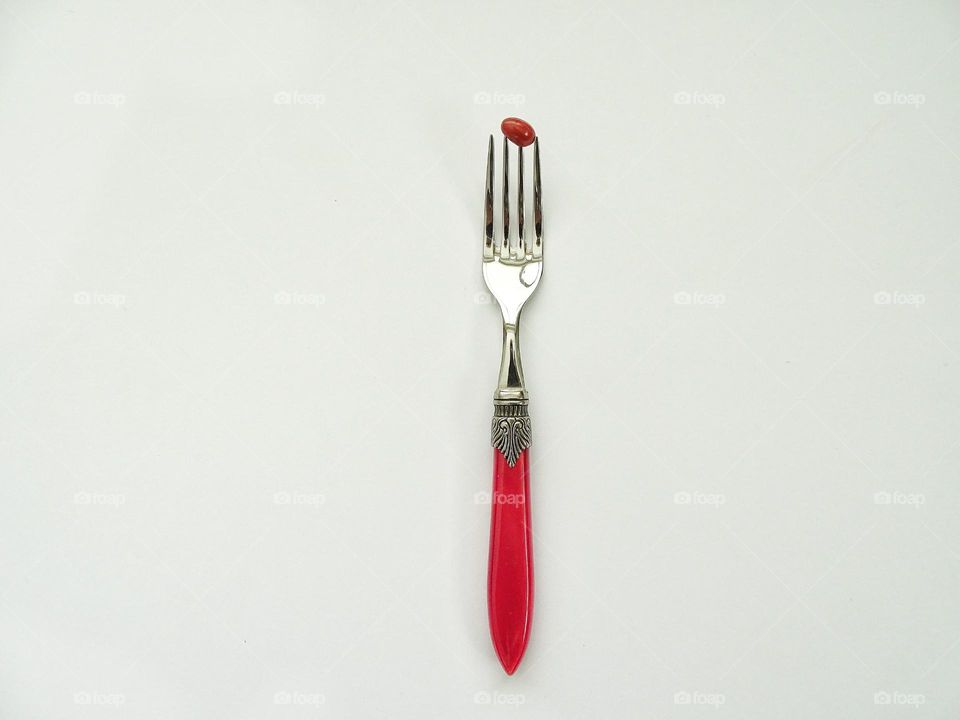 Fork with pill