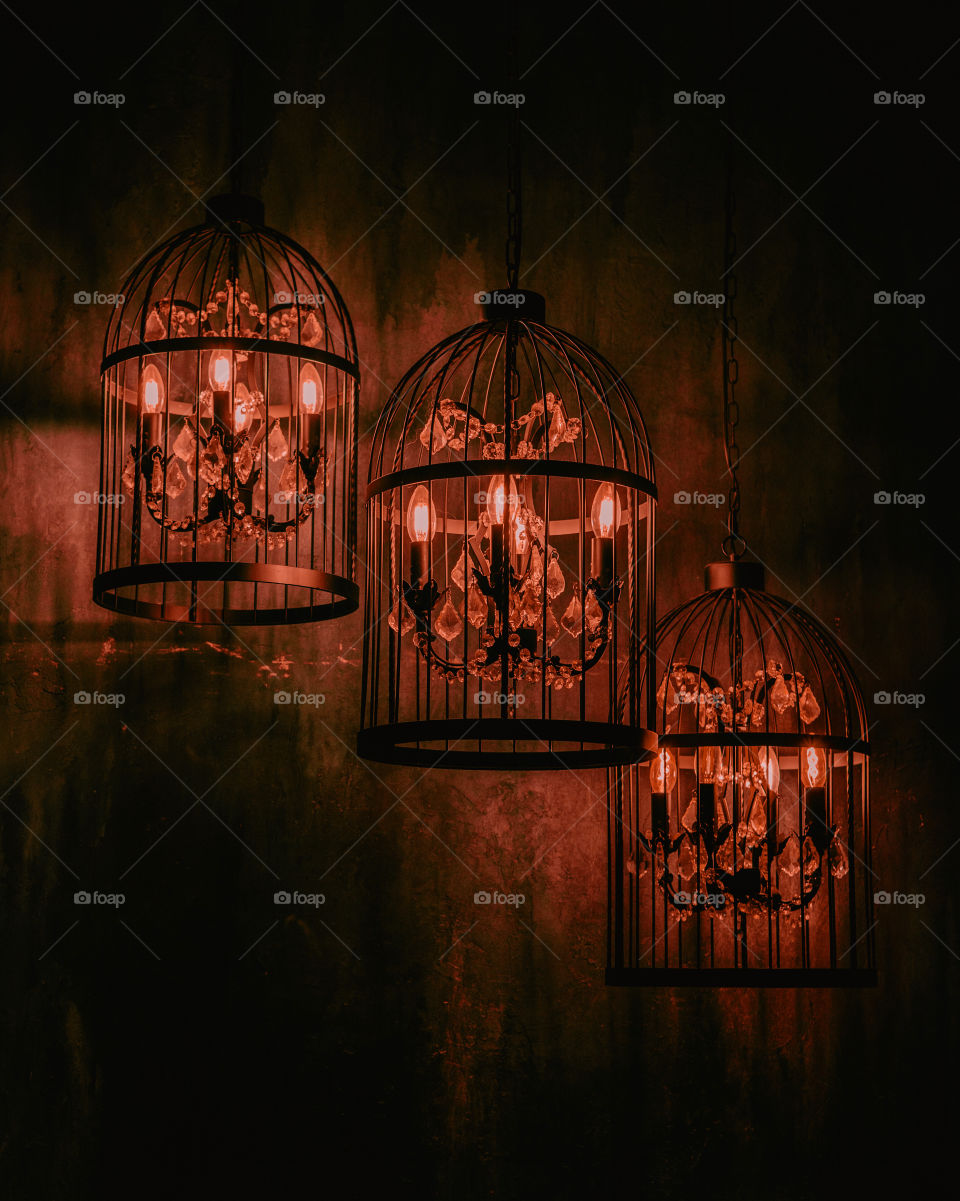 red chandelier, moody shot, candle light 