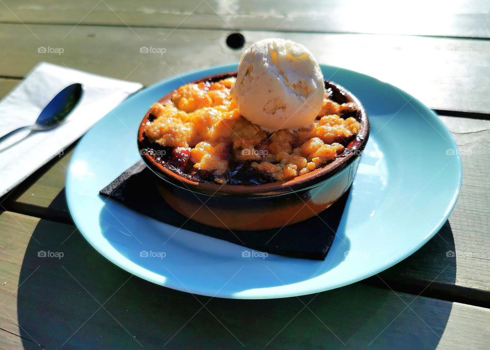 Pie with berries and ice cream