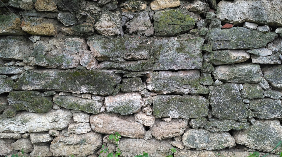 Old mossy stone wall