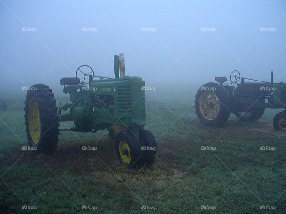 Tractors in the mist