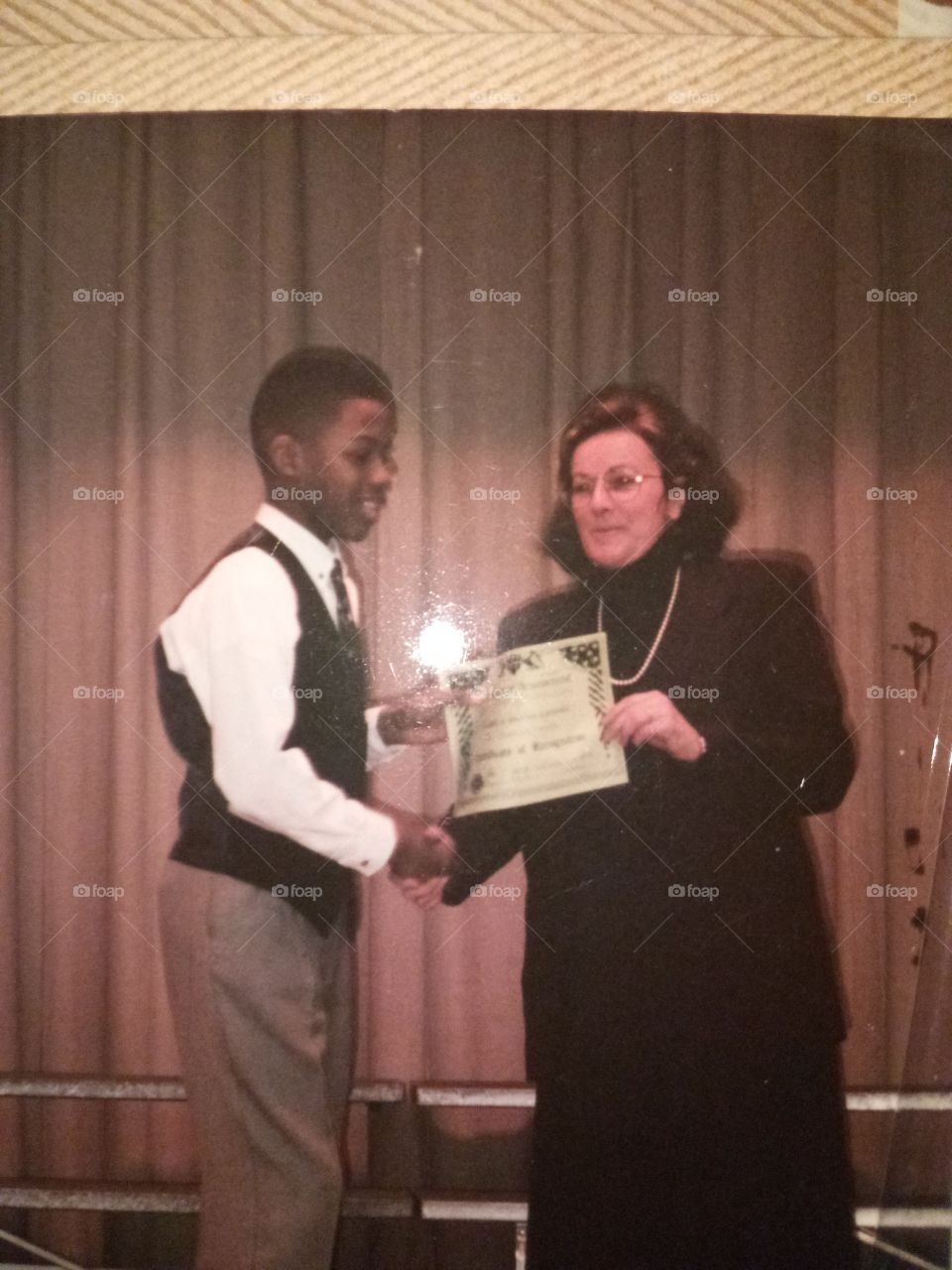 me at age 12 receiving an award from the prinicpal in elementary