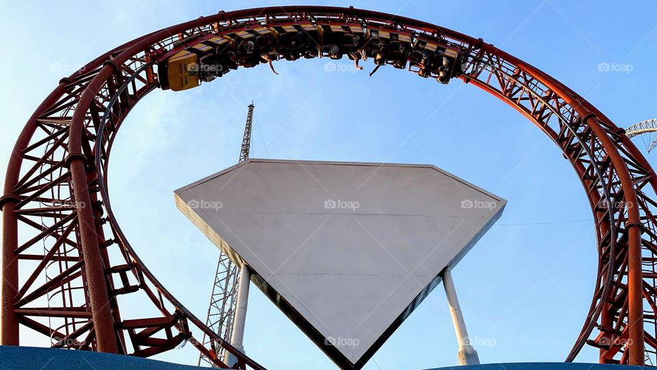 People having fun on the roller coaster