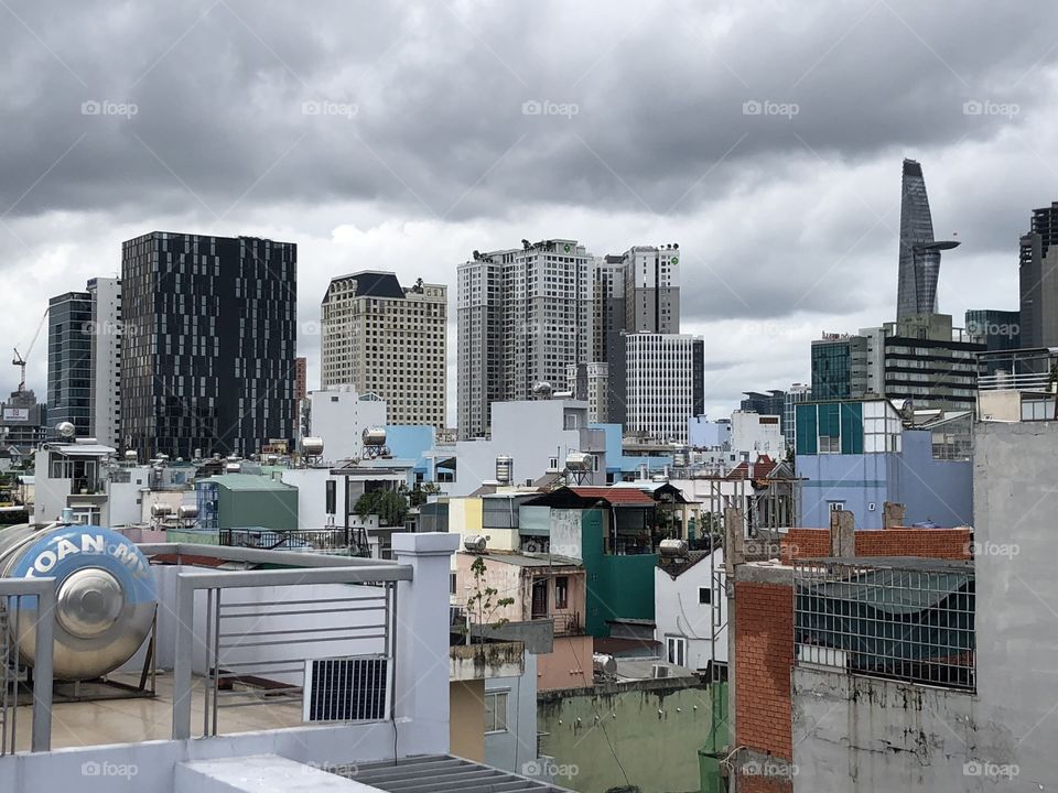 A small corner in Ho Chi Minh City. This city belongs to Vietnam, has a dense population and dense housing.