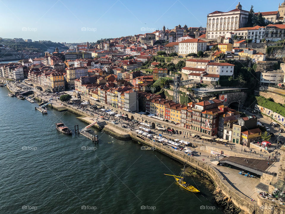 A view of hilly Porto and Rio Douro, looking downwards from Dom Luís I Bridge