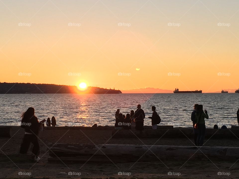 People gathering to watch the sun