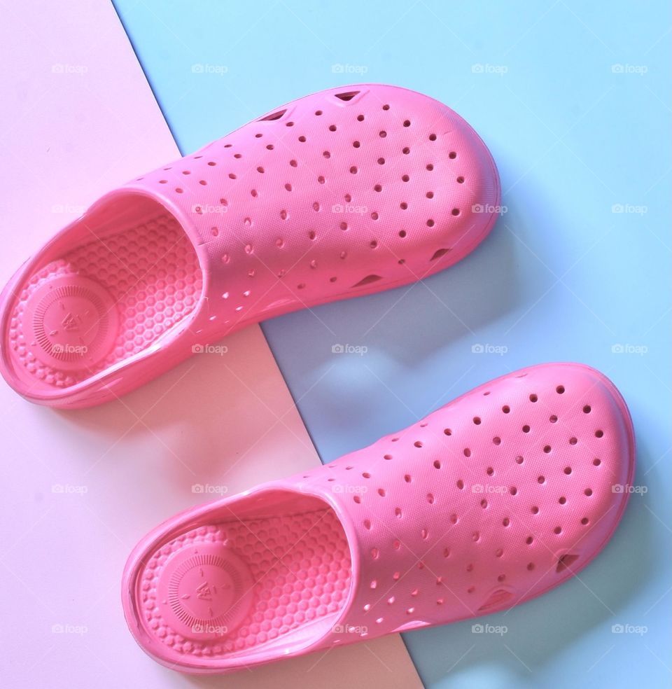 Barbie pink crocs flat lay
