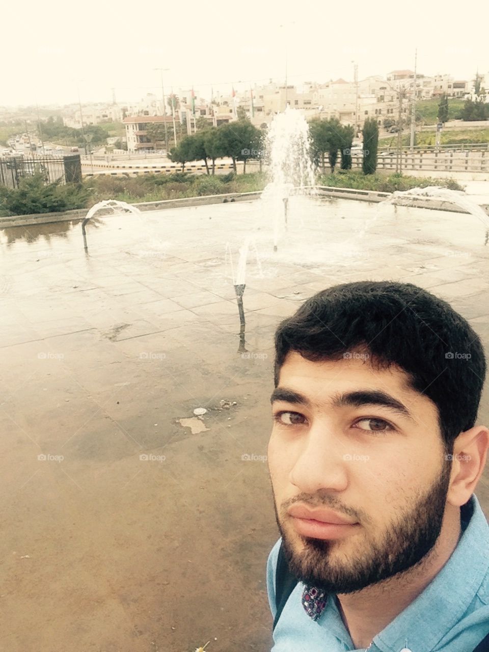 Selfie and Fountain in back 