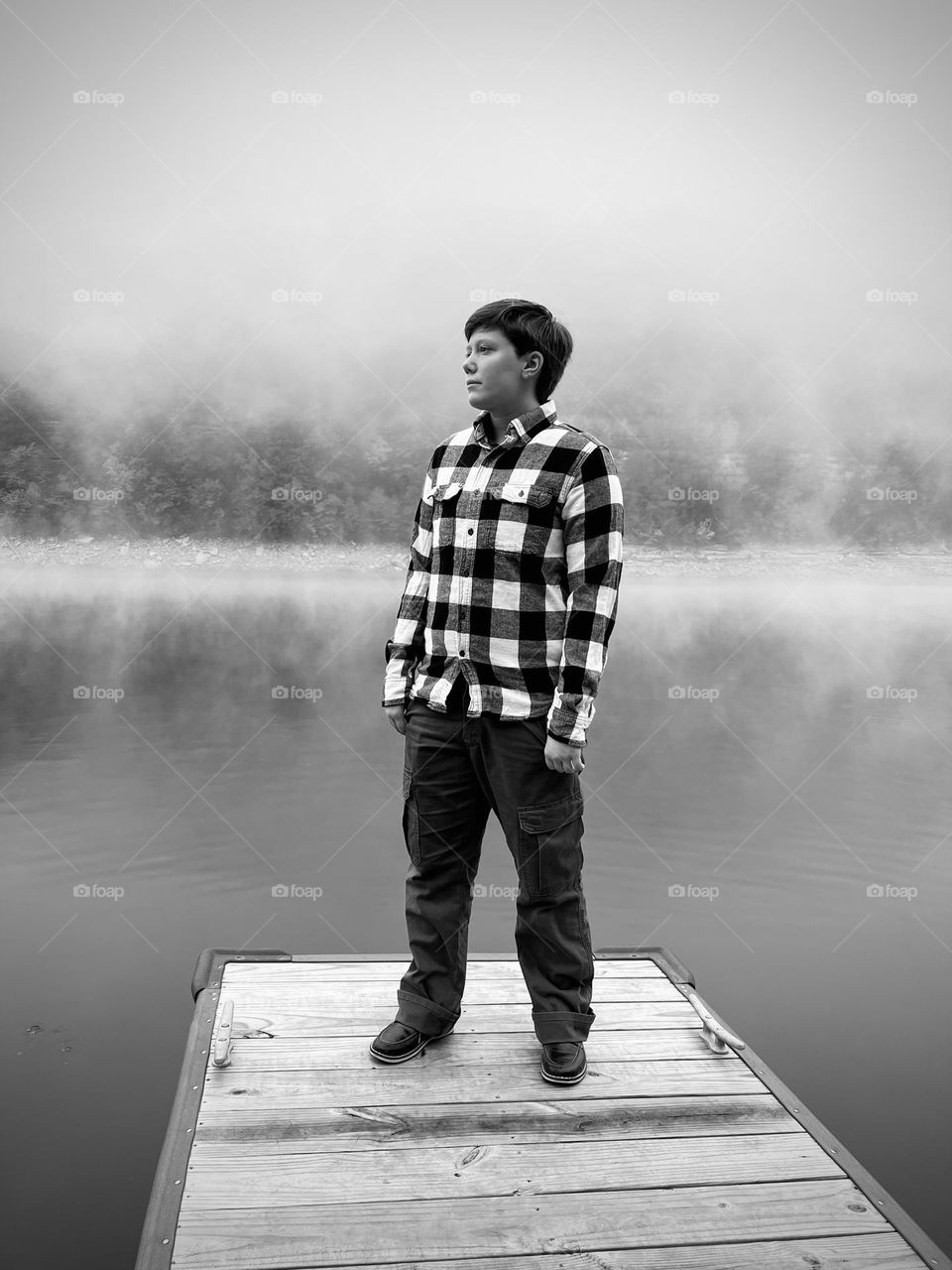 Standing on the dock on a misty morning 