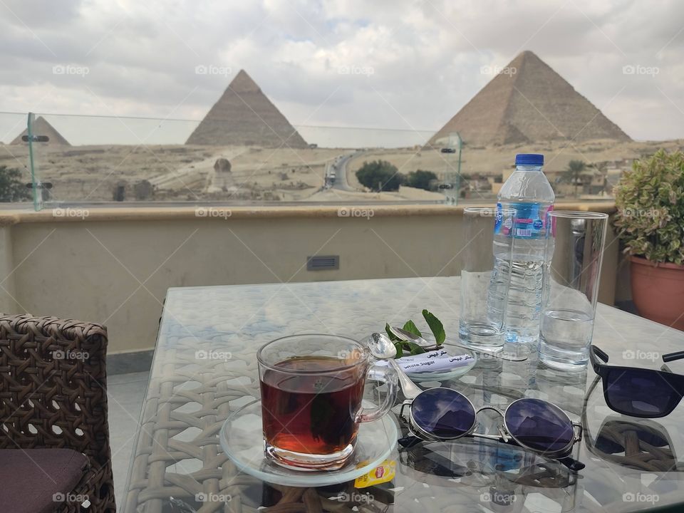 a great day in Great Giza Pyramids morning drinks coffee & and Egyptian tea with mint 
this is Egyp