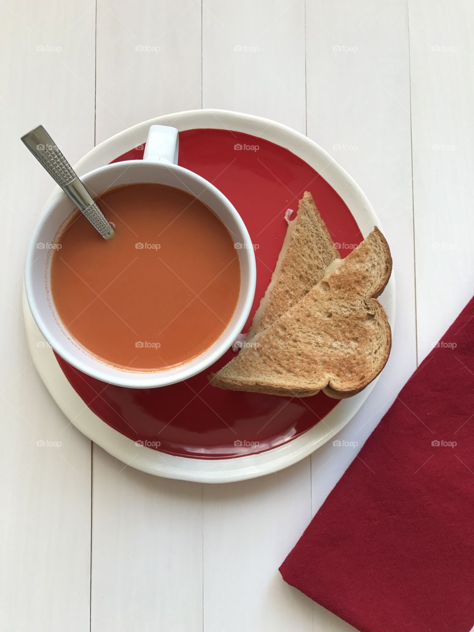 High angle view of sandwich and tomato soup