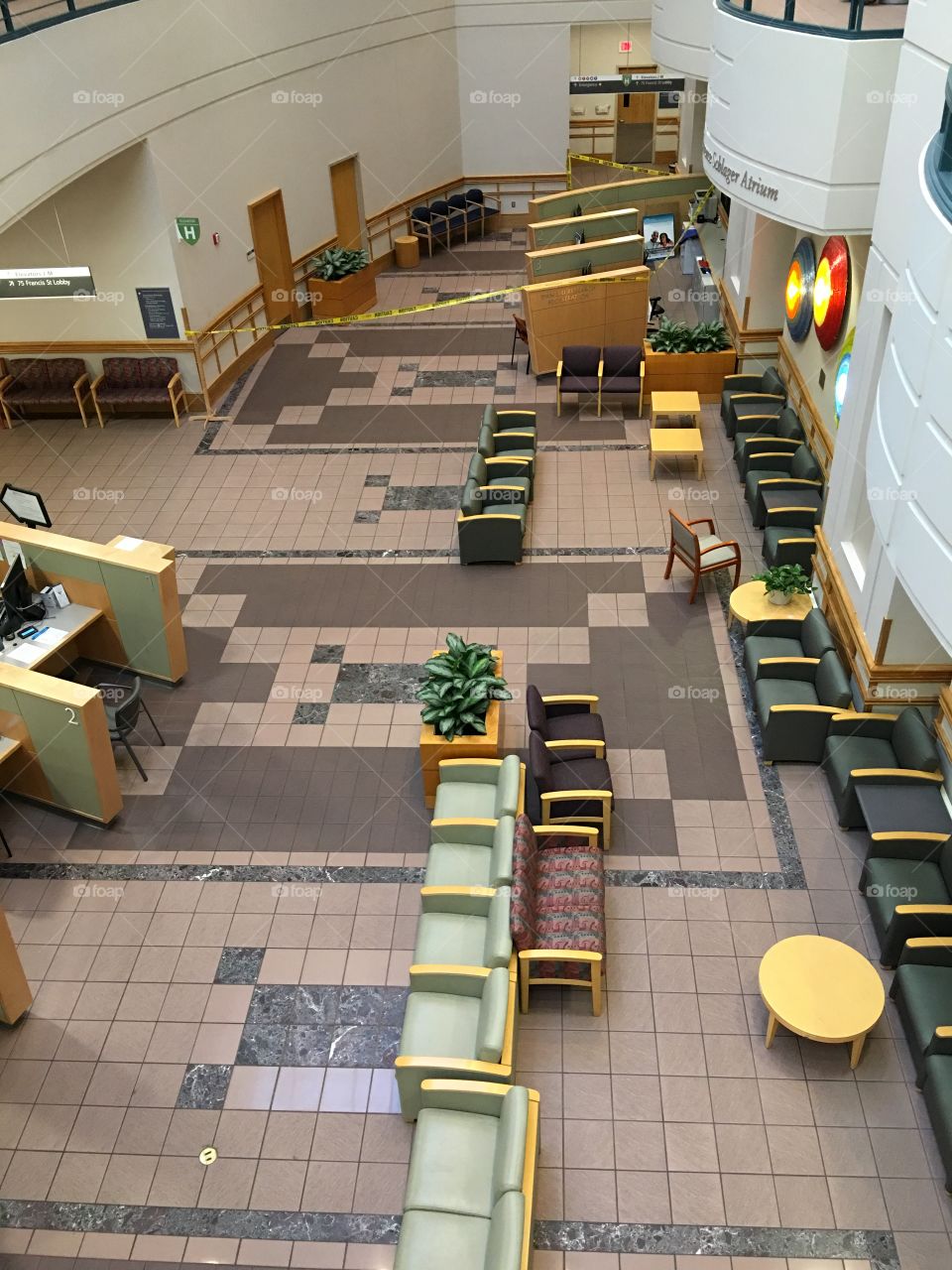Hospital Lobby Empty, From Above
Had opportunity to see the lobby from the 2nd floor looking down at all the empty seats, information area, tables, floor space and patient registration booth also seen. There were no people anywhere.