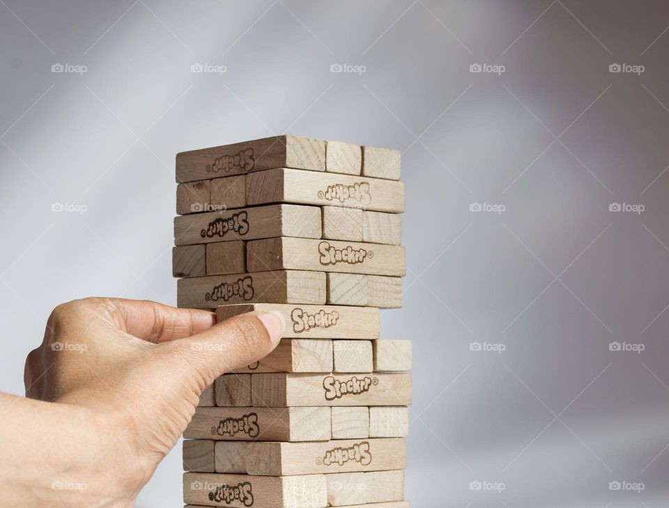 Playing jenga.