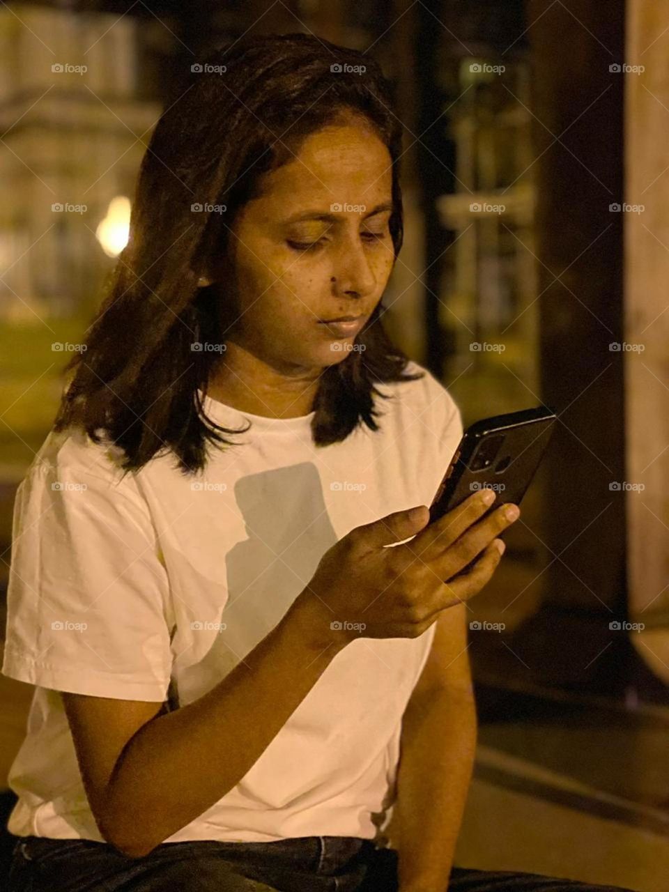 Checking Scrolling Reading and laughing