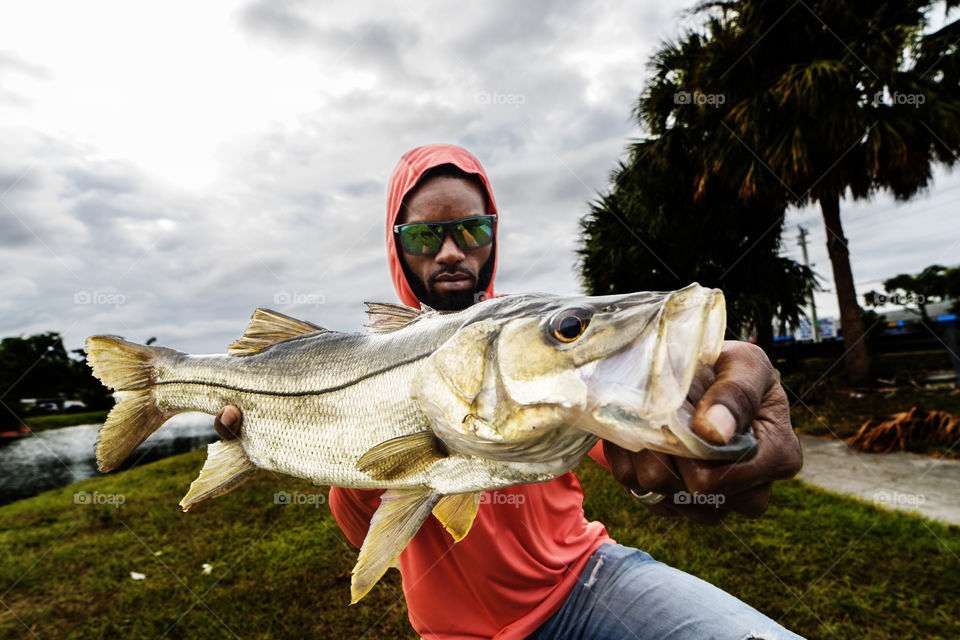 Holding A Freshwater Snook