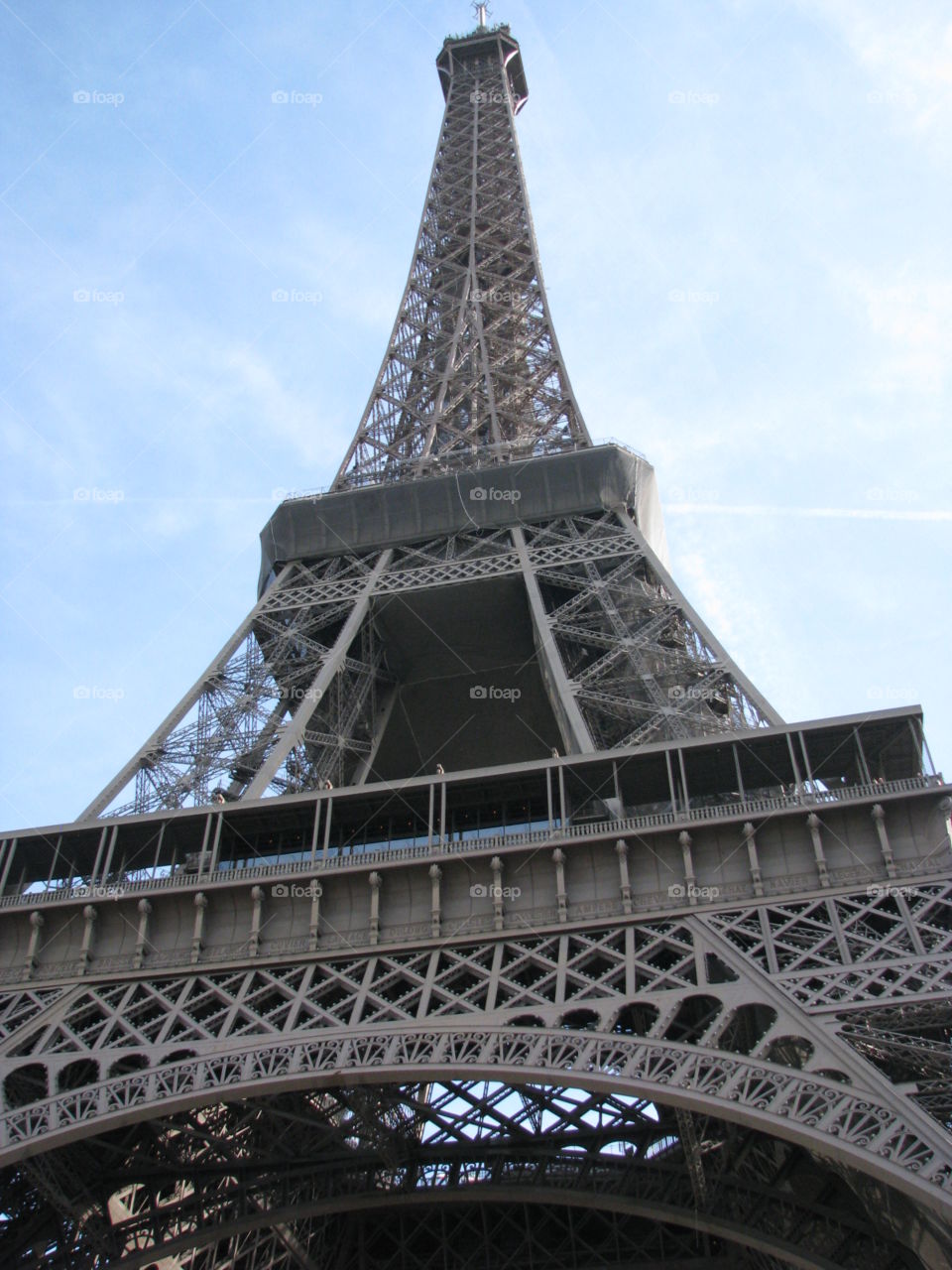 Under the tower. Eiffel Tower - Paris