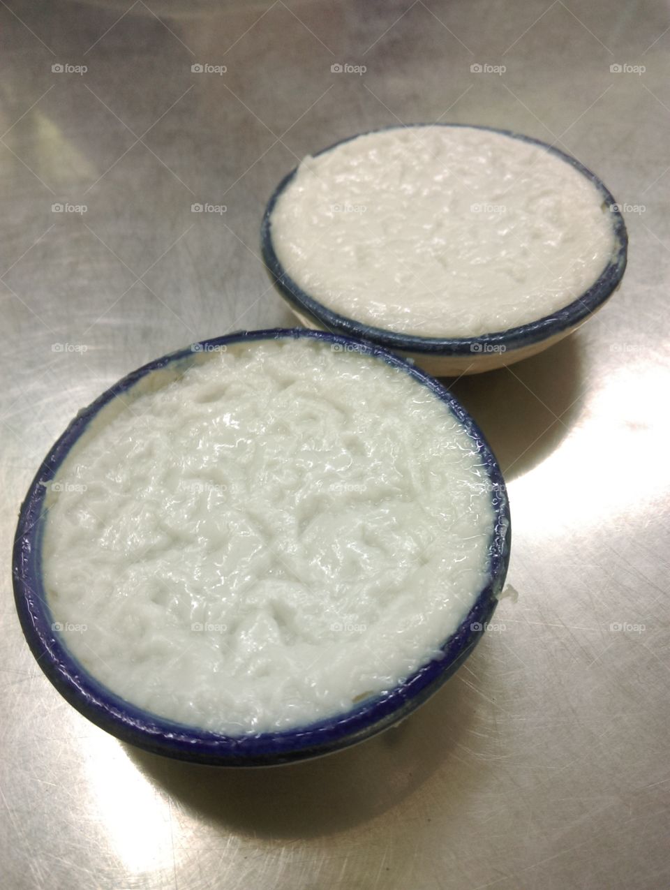 Coconut milk custard in small porcelain, 'Kanomtuay' Thai desert. Thai traditional desert we called Kanomtuay.Kanomtuay made from rice powder and coconut milk.Sweet tasted and yummy.