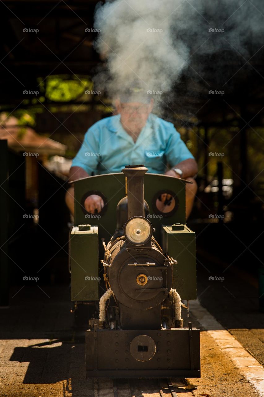 Stream train driver on model stream train