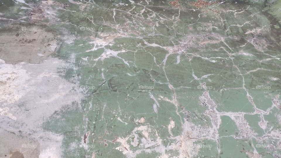 Green cracked concrete texture