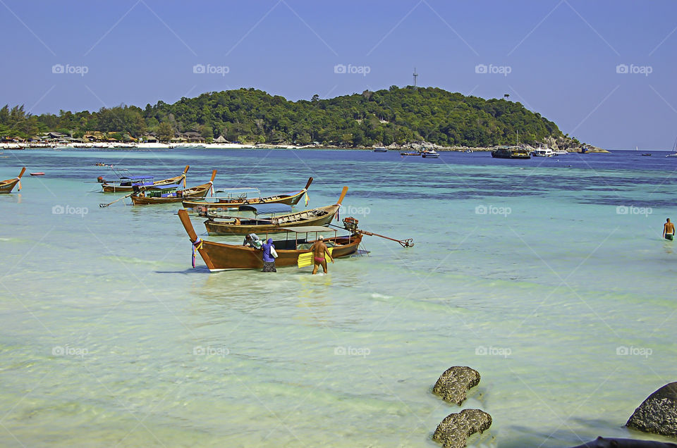 The beauty of the summer sea and the ship on the beach , Koh Lipe , Satun in Thailand.