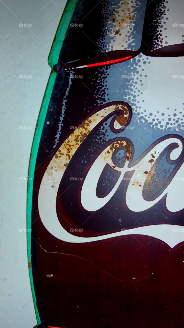 rust on Coca-Cola sign