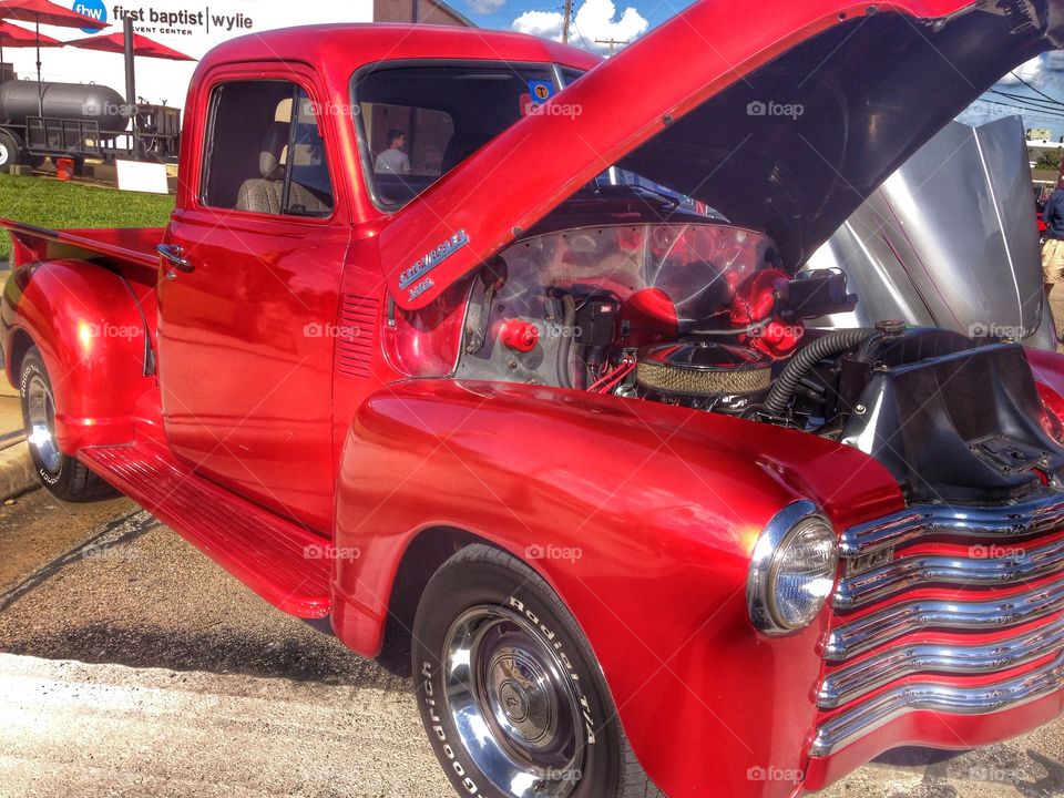 Candy apple red . Red classic truck at at show