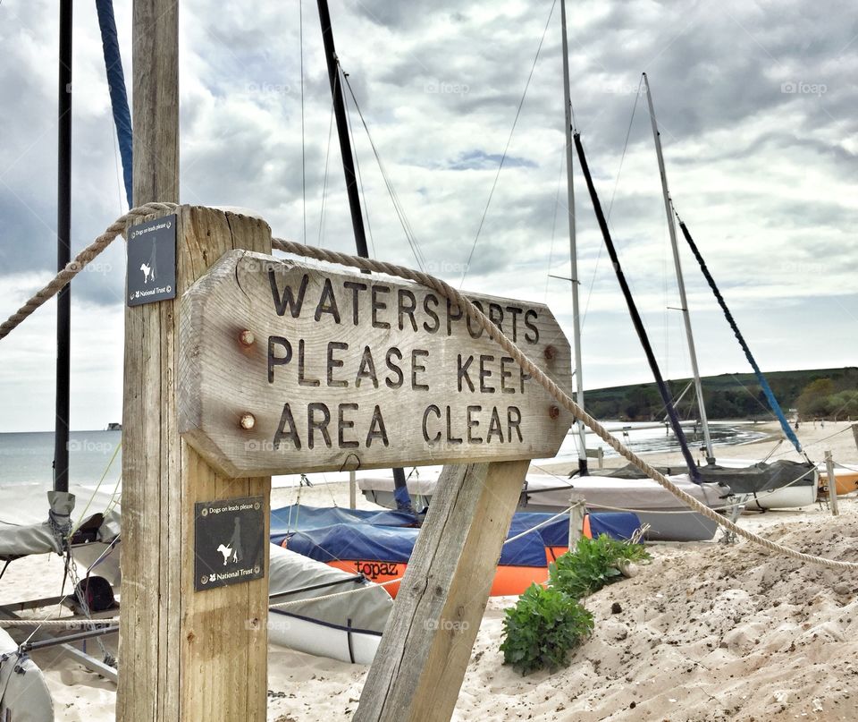 Watersports Sign On The Beach