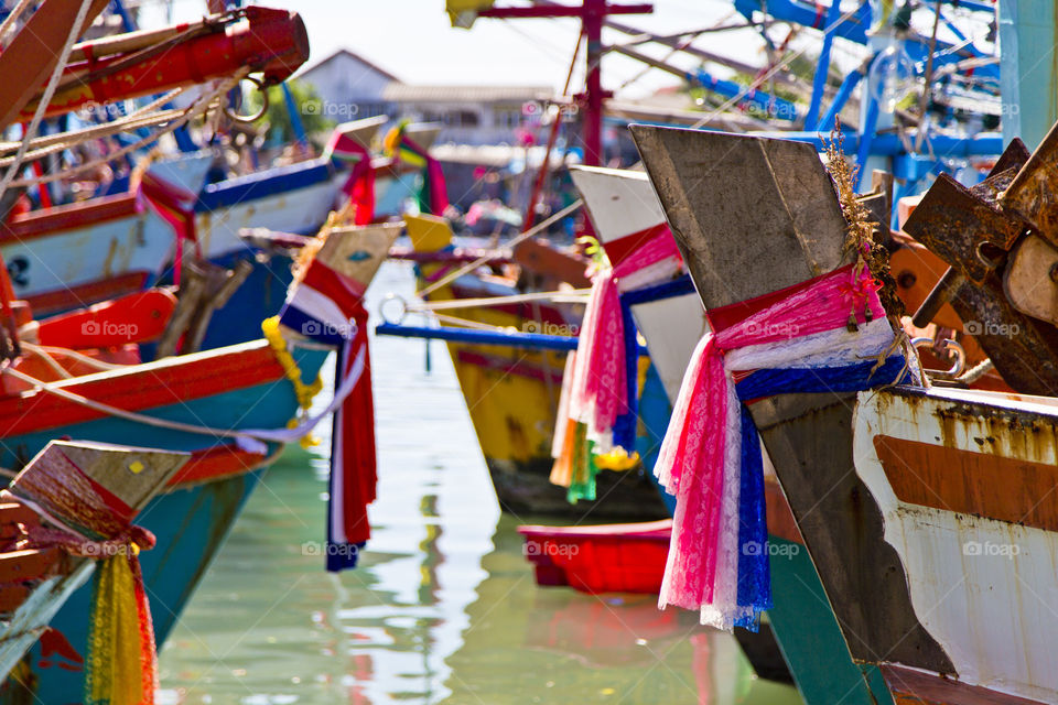 Colors of the sea. colorful fishing boats at pier in Thailand