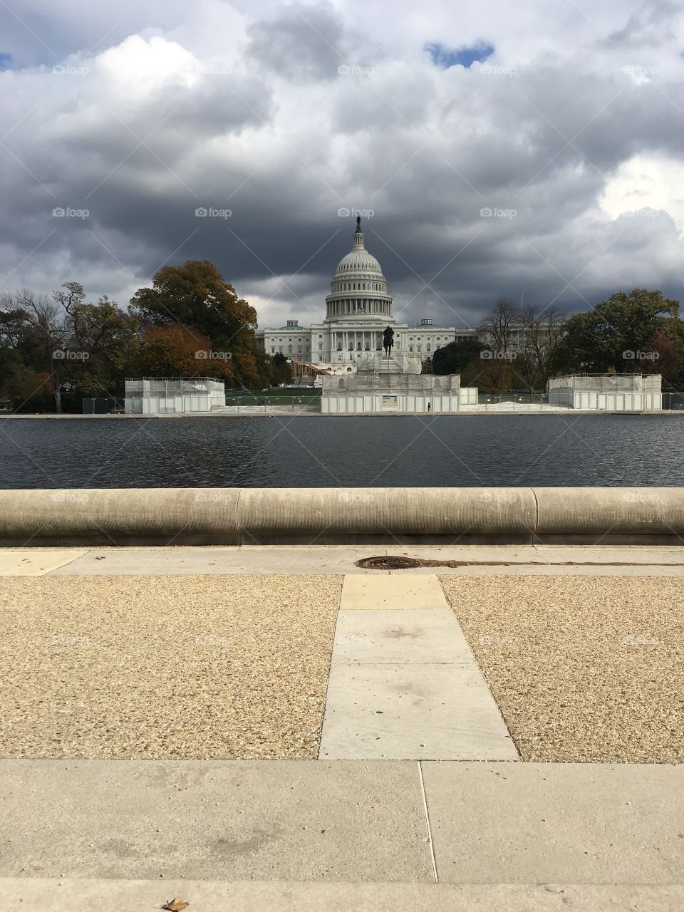 Storm clouds brew over the Capitol Building before rainfall in Washington D. C. the day after the election. Scaffolding and other construction in progress was for the inauguration yet to come.