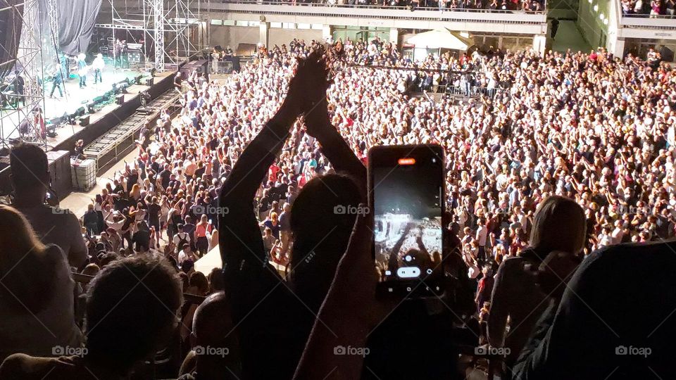 Taking photo at the rocks concert