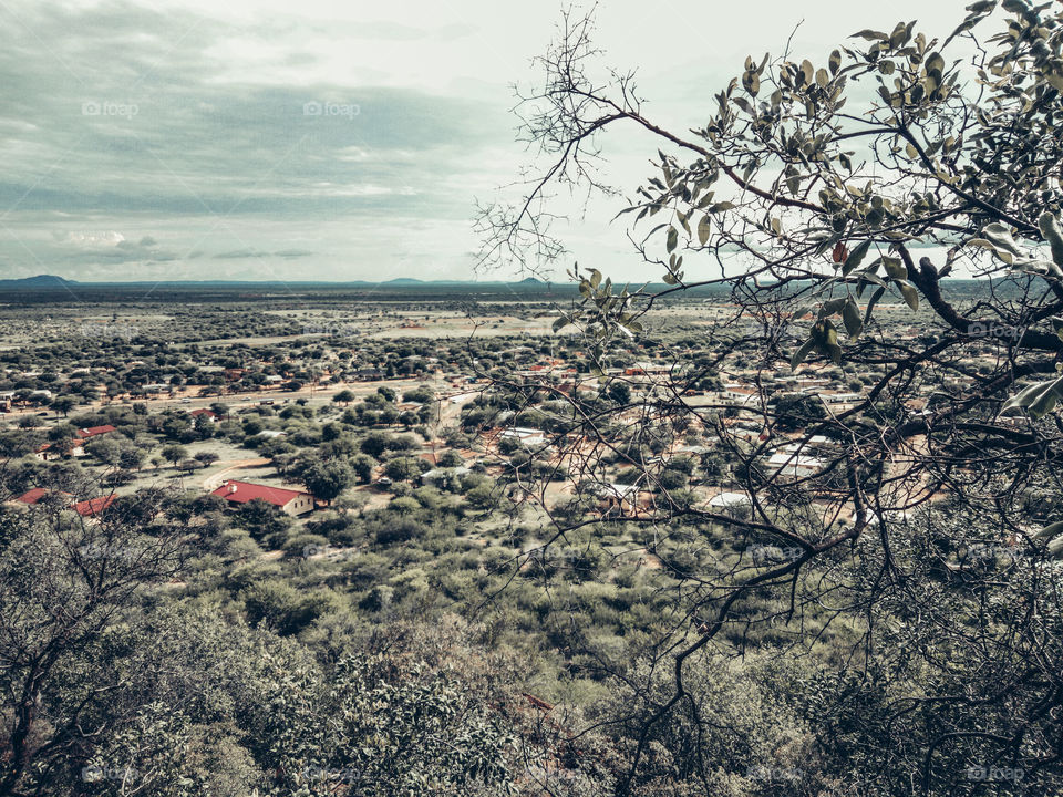 Beautiful hilltop view of a hillside settlement on a partly cloudy day