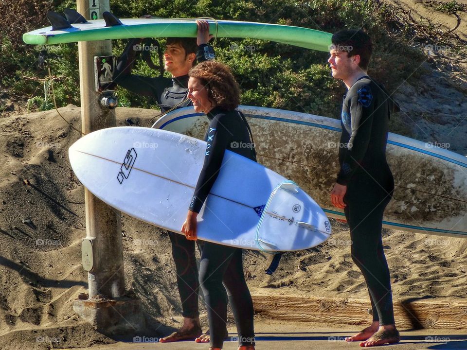 Three California Surfers. Surfers On Their Way To The Beach