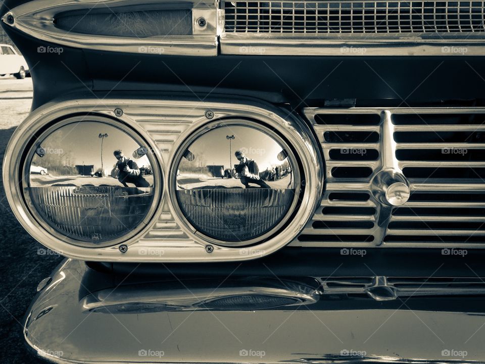 Monochromatic Chrome Reflections On A Classic Car With Front End Detail