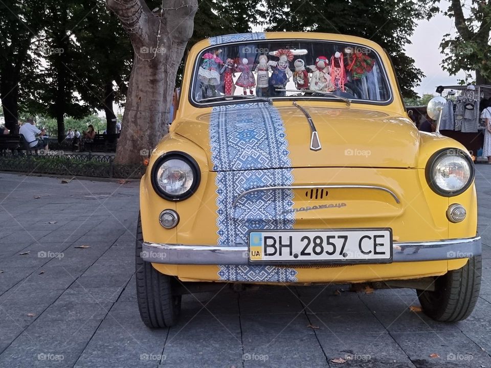 Historic Zaporozhets car, in blue and yellow colors, at the celebration of the 30st anniversary of Ukraine