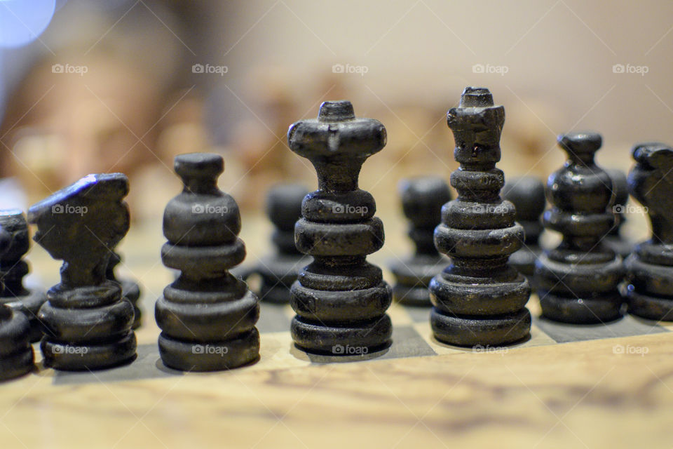 Close Up of Black Chess Pieces