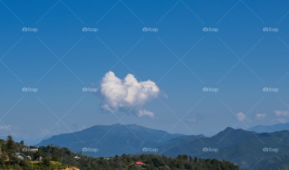 cloud jumping over the mountain