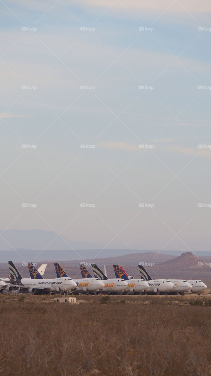 Jumbo jet death row airport. Jumbo jet group of aircrafts parked at desert airport