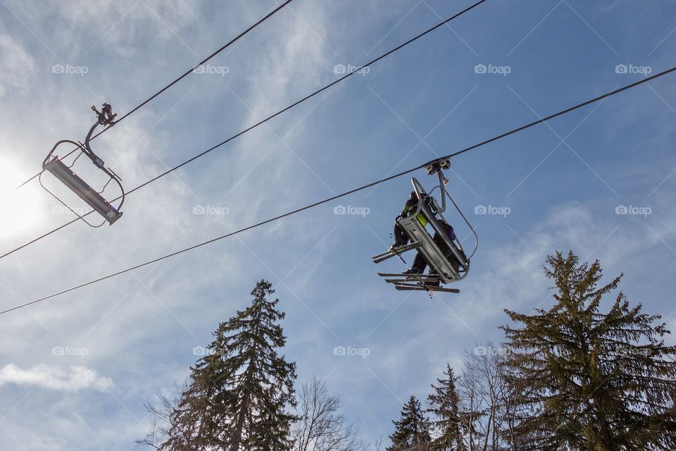 Chair lift against blue sky in the mountain in Bulgaria