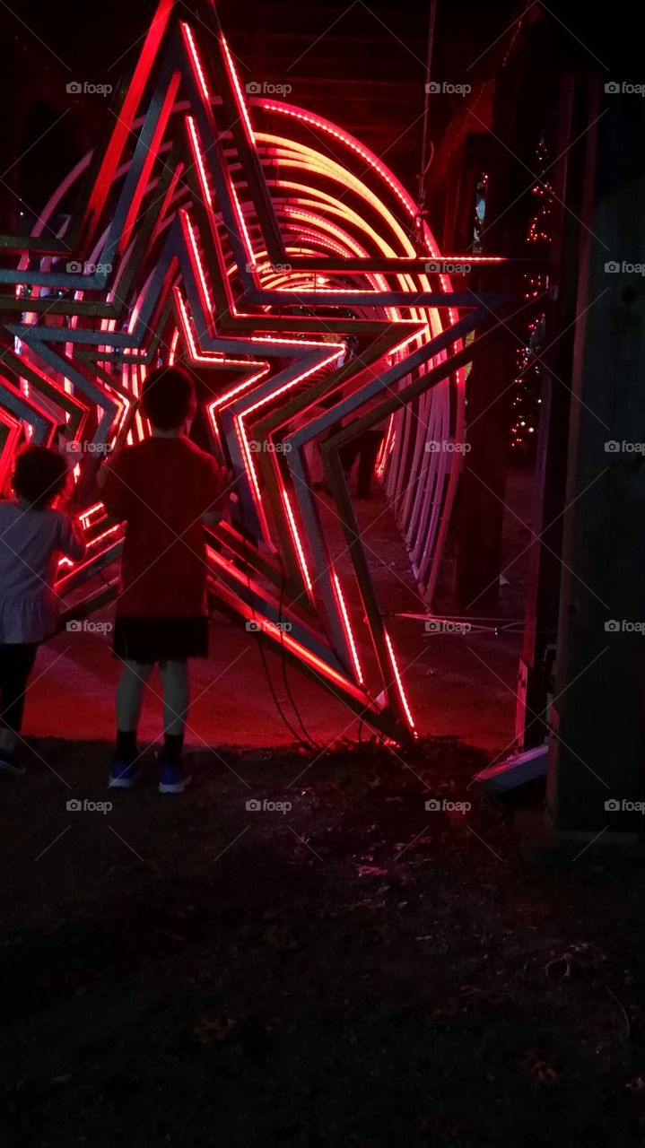 2 children red neon star