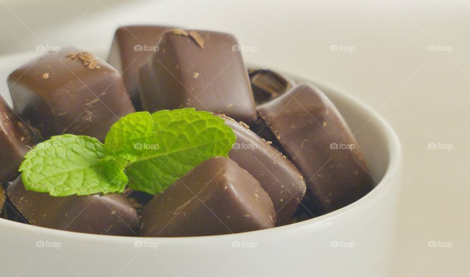 Mint leaf on chocolate candy