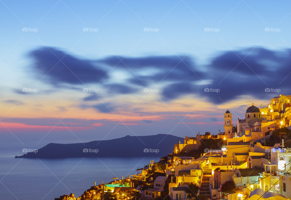 View of domed churches and sea in Oia, Santorini, Greece