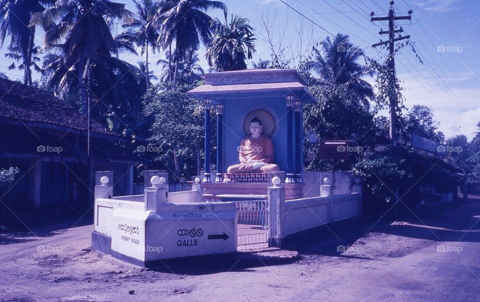 Buddha shrine in the street in Sri Lanka