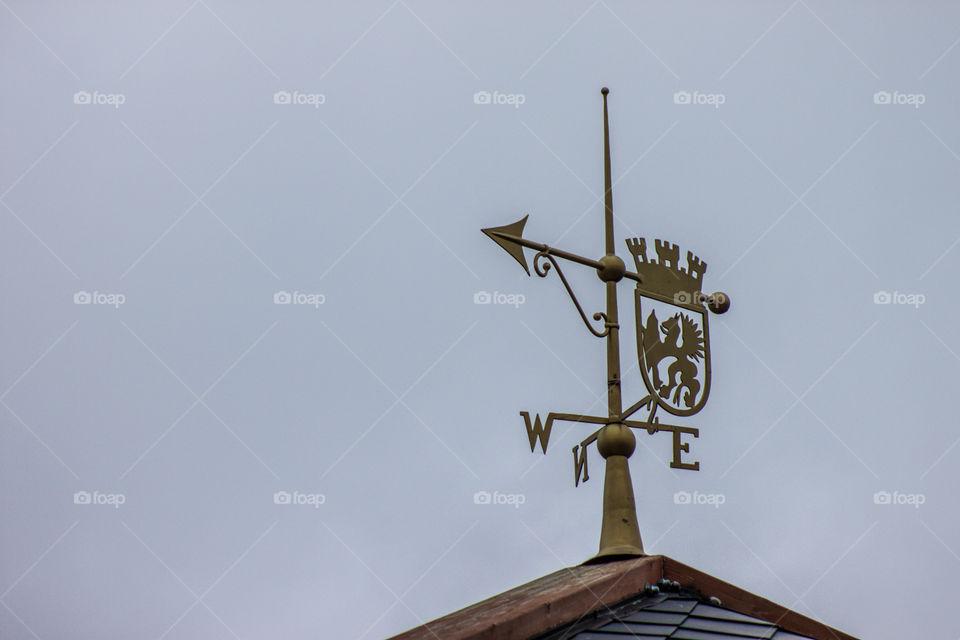 Compass rose. Compass rose on the blue sky background