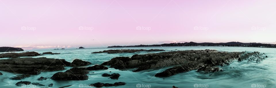Coastal panorama Batemans Bay Australia in the morning long exposure 