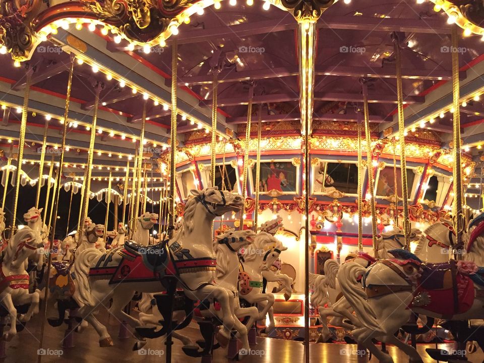 Carousel. The carouse in Disneyland at night. 
