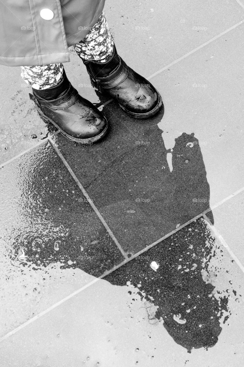 Low section of woman standing on floor