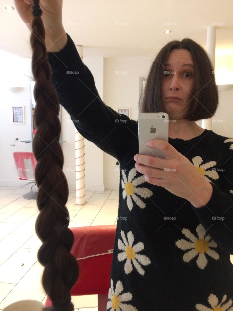 I’m rarely seen in a beauty salon, but every few years I do get a haircut. This time I got it cut short as I was about to spend 6 months in a caravan travelling across Europe. Here I am holding 5 years worth of hair, which went to a cancer charity.