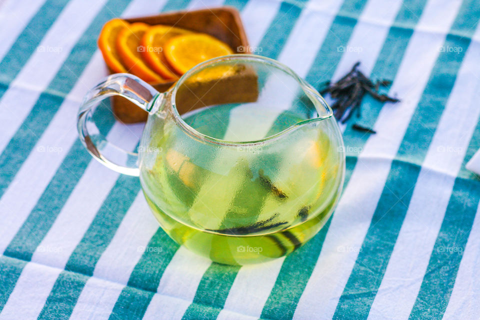 Elevated view of green tea in jug