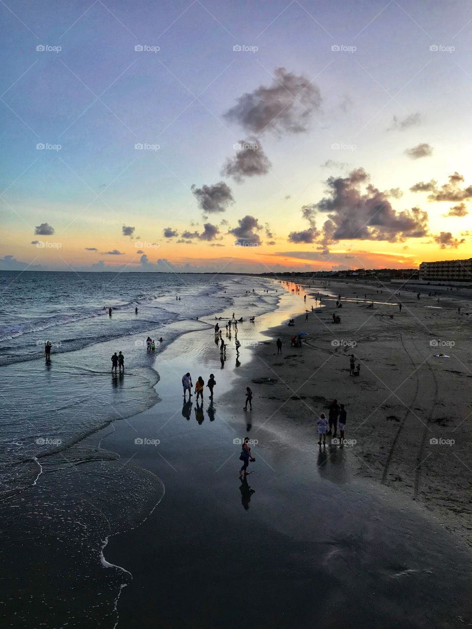 An evening walking on the beach watching the sun go down